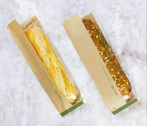Vegware_concept_bagstogo_VNWB4G_greenband_baguette_pumpkinseed_overhead kraft NatureFlex side-window baguette bag